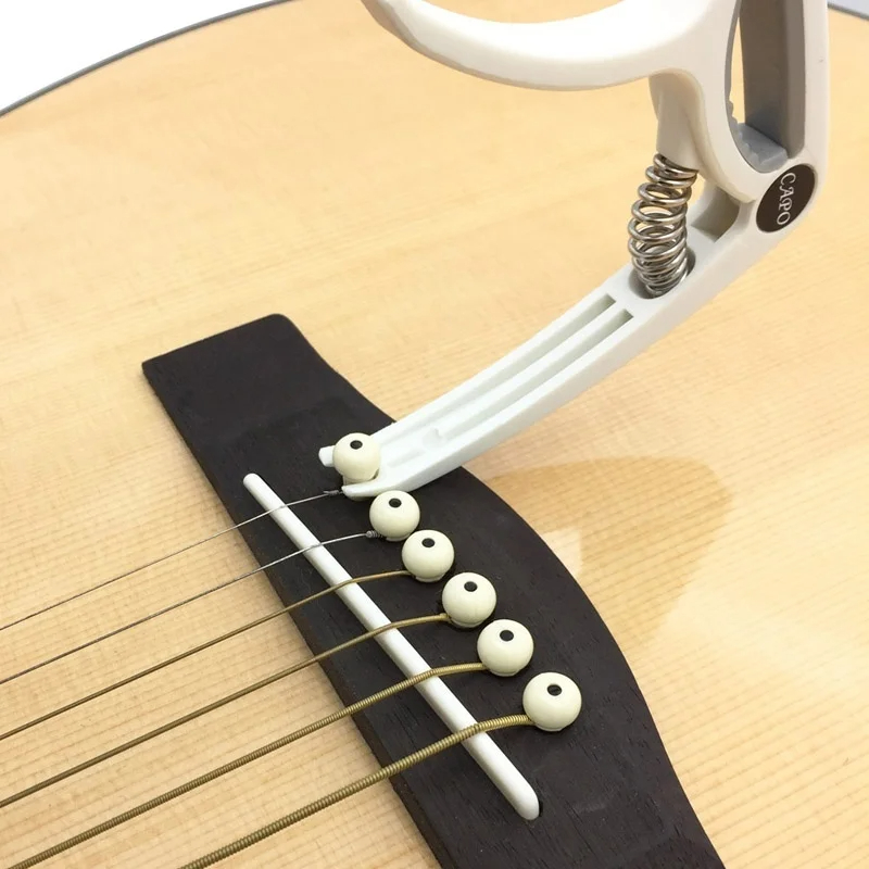 Plastic Guitar Capo for 6 Stri - Musical Instrument Gif recensione e prezzo