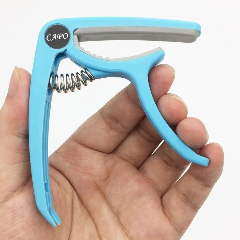 Plastic Guitar Capo for 6 Stri - Musical Instrument Gif recensione e prezzo