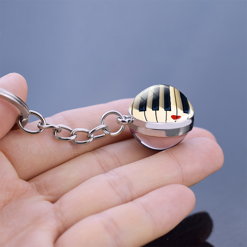 Piano keychain, picture of dam - Musical Instrument Glass recensione e prezzo
